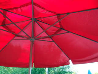 under the red umbrella