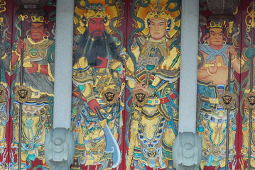 chinese gods painting on the doors