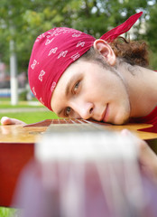 teenage boy with a guitar