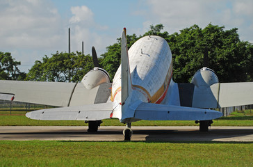 Classic DC-3 propeller airplane rear view
