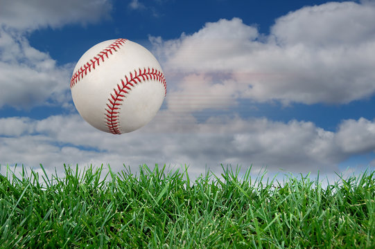 Baseball after impact with grass