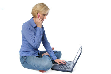 Naklejka premium Attractive blond on the cell phone