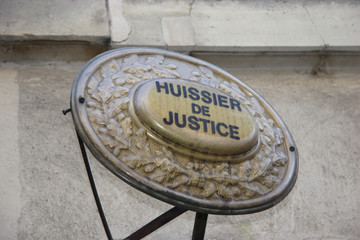 Plaque de huissier de justice