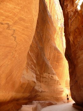A woman in a Siq gorge, Petra, Jordan