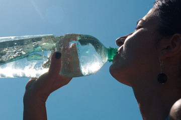 woman drinking mineral water