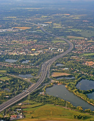 m25 motorway passing through countryside and towns