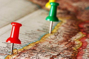 Thumbtack in a map