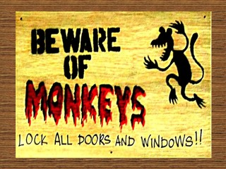 danger sign beware of monkey