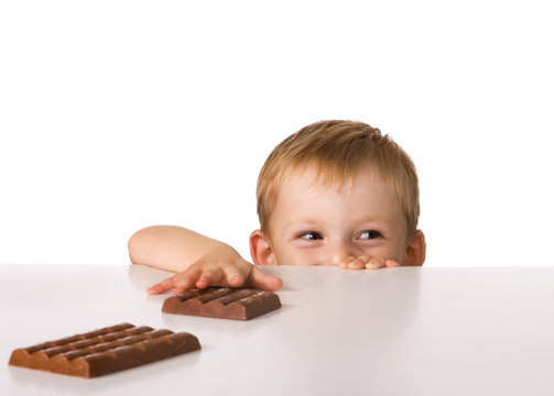 The child and a chocolate