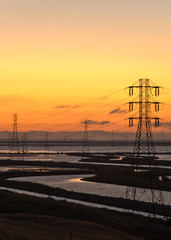 Fototapeta na wymiar sunset water and towers