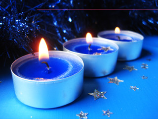 blue candles with decoration stars
