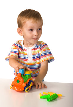 The child with toy machine