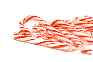 Candy canes on white