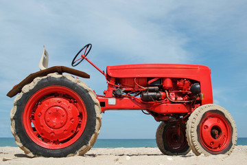 Red tractor on a beach  (Normandy)