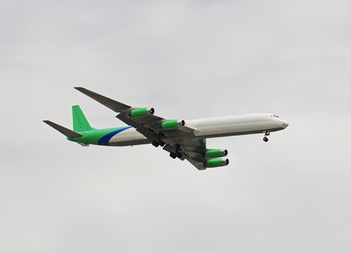 Classic DC-8 cargo aircraft approaching delivery destination
