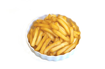 Bunch of french fries in a white plate isolated on white