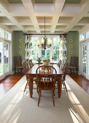 beautiful dining room with detailed crown molding