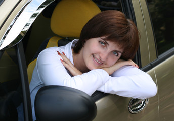 Portrait of the girl in car