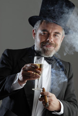 man with glass and cigar