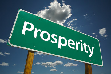 Prosperity Road Sign with dramatic clouds and sky.