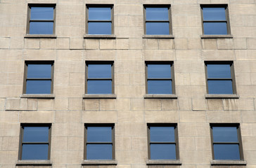 Fototapeta premium Blue windows of a modern building