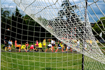 Young soccer players warming up