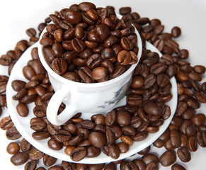 Coffee beans in a cup