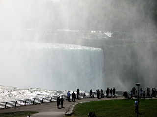 Tourist looking at Niagara Falls