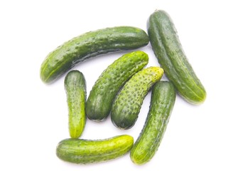 fresh cucumbers isolated over white background