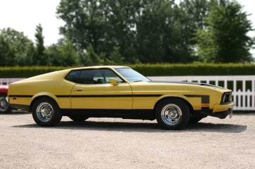 Zelfklevend Fotobehang Snelle auto Classic American yellow muscle car