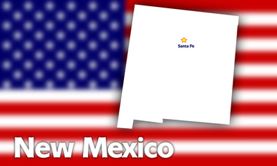 New Mexico state contour against blurred USA flag