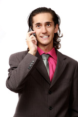 emotional businessman talking by mobile phone. on white