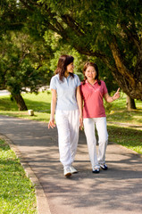 Obraz premium Women Walking Outside