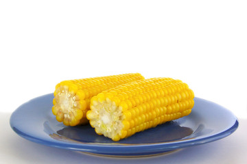 Two corns on plate