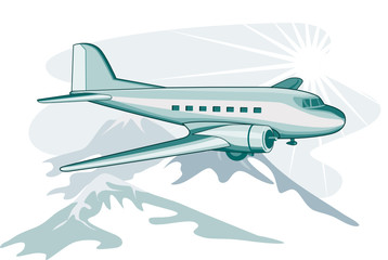 Airliner flying over mountains