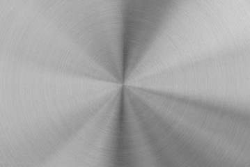 Circularly brushed stainless steel background.