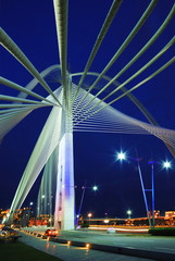 hanging bridge in evening with dark blue sky