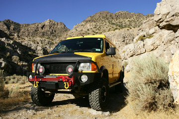 4x4 yellow van off road in Kings Canyon, Utah