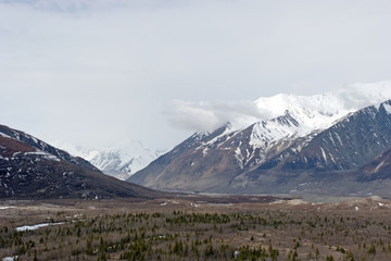 Fototapeta na wymiar Snow melting on Alaska Range