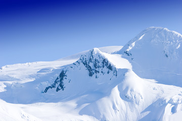 Snowy mountain peaks