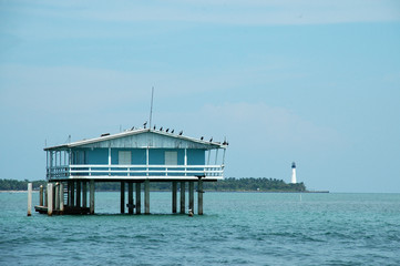 Blue Stilt House in Stiltsville with Lighthouse