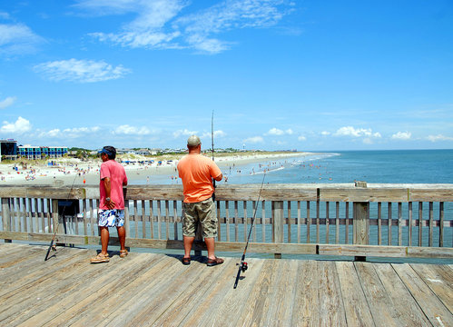 Fototapeta fishermen  on pier