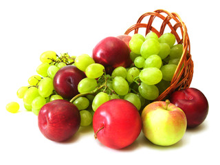 peach, grapes, plume and apple in basket