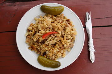 Hot potatoes with sausage,eggs and vegetables 
