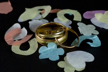 Wedding rings and confetti