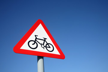 British cycle route ahead warning sign and a big blue sky.