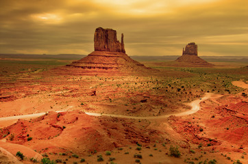 Sunrays through clouds at sunset, Monument Valley