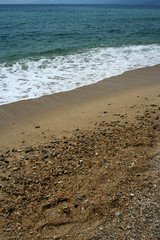 Beach detail on Agean sea beach, Greece