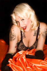 Blonde Tattooed Woman in a Black Bra