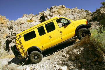 4x4 yellow van off road in Kings Canyon, Utah